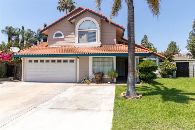 1573 E Brockton Ave, Redlands, CA 92374 - view of front of house featuring a tiled roof, concrete driveway, a front yard, and a garage