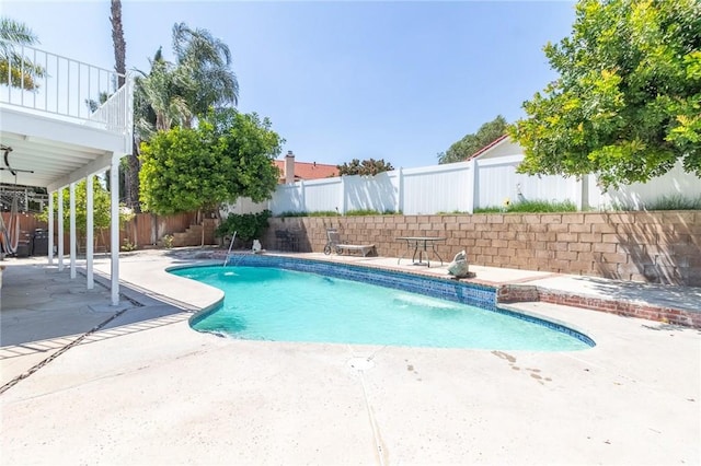 1573 E Brockton Ave, Redlands, CA 92374 - view of swimming pool with a fenced backyard and a patio