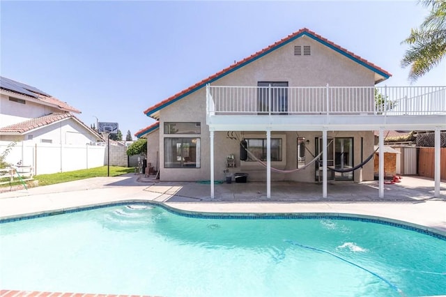 1573 E Brockton Ave, Redlands, CA 92374 - view of pool with a patio area and a fenced backyard