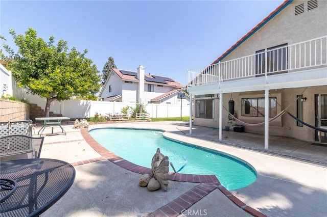1573 E Brockton Ave, Redlands, CA 92374 - view of pool with a patio area and a fenced backyard
