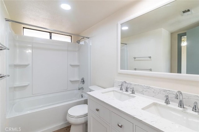 1573 E Brockton Ave, Redlands, CA 92374 - bathroom with toilet, double vanity, bathtub / shower combination, and recessed lighting