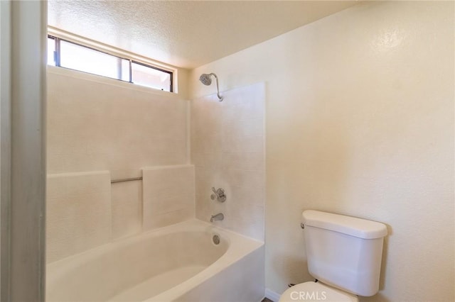 1573 E Brockton Ave, Redlands, CA 92374 - bathroom featuring toilet,  shower combination, and a textured ceiling