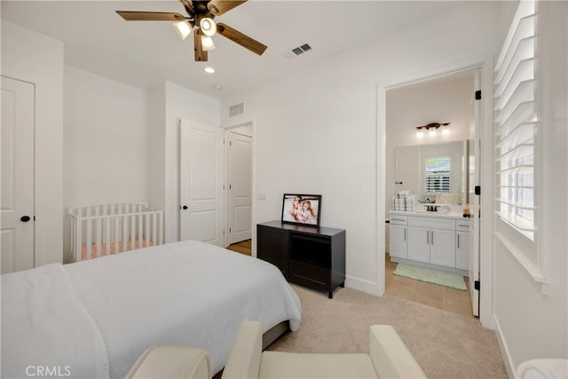 11638 Oakton Way, Corona, CA 92883 - bedroom with light carpet, connected bathroom, baseboards, and recessed lighting