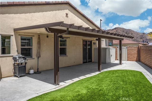 11638 Oakton Way, Corona, CA 92883 - rear view of property with stucco siding, a patio, and a mountain view