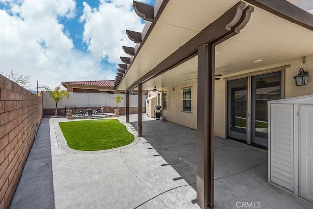 11638 Oakton Way, Corona, CA 92883 - fenced backyard with a patio and ceiling fan