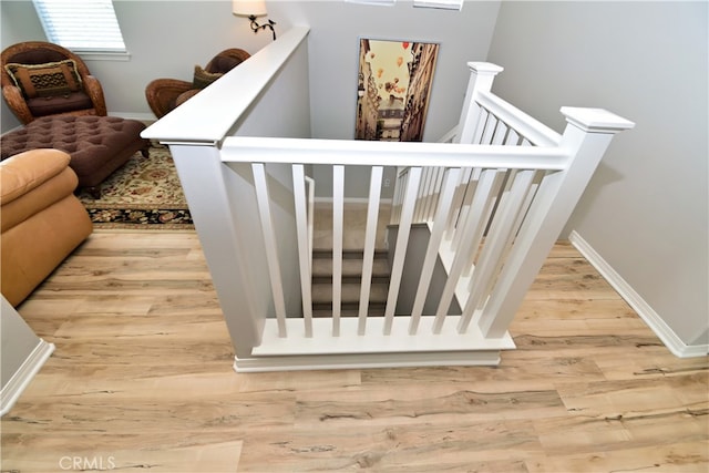 35582 Laurel Tree Ct, Winchester, CA 92596 - staircase featuring wood finished floors and baseboards