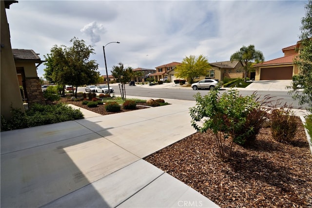 35582 Laurel Tree Ct, Winchester, CA 92596 - view of yard featuring a residential view and concrete driveway
