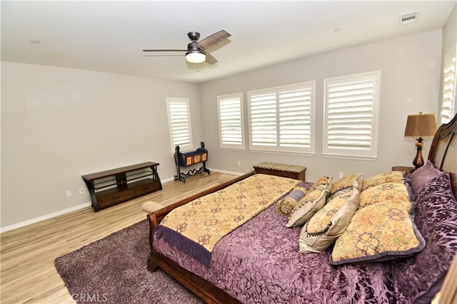 35582 Laurel Tree Ct, Winchester, CA 92596 - bedroom with wood finished floors and a ceiling fan