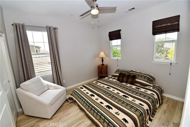 35582 Laurel Tree Ct, Winchester, CA 92596 - bedroom with light wood-style floors and a ceiling fan