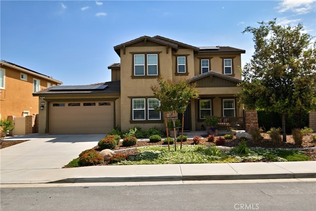 35582 Laurel Tree Ct, Winchester, CA 92596 - view of front of house featuring roof mounted solar panels, a porch, and stucco siding