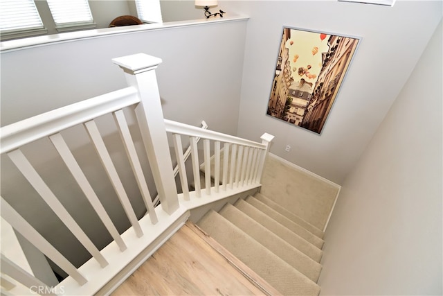 35582 Laurel Tree Ct, Winchester, CA 92596 - staircase featuring wood finished floors