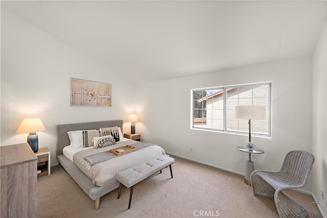 7455 Bellingham Ave, North Hollywood, CA 91605 - carpeted bedroom featuring lofted ceiling and baseboards