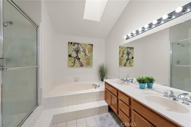 7455 Bellingham Ave, North Hollywood, CA 91605 - full bathroom featuring a skylight, a garden tub, double vanity, and an enclosed shower