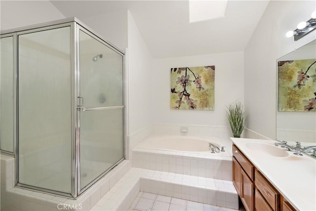 7455 Bellingham Ave, North Hollywood, CA 91605 - full bathroom with vanity, a garden tub, and a stall shower