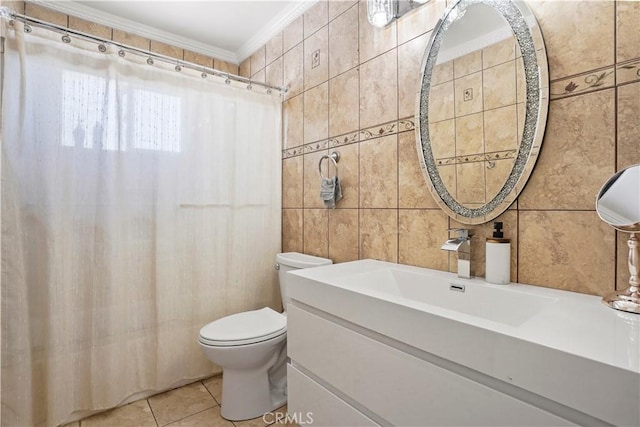 9021 Oneida Ave, Sun Valley, CA 91352 - bathroom with tile walls, toilet, vanity, ornamental molding, and tile patterned flooring