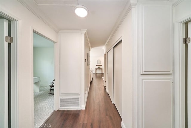 15544 Andorra Way, San Diego, CA 92129 - hallway featuring dark wood-style flooring and ornamental molding