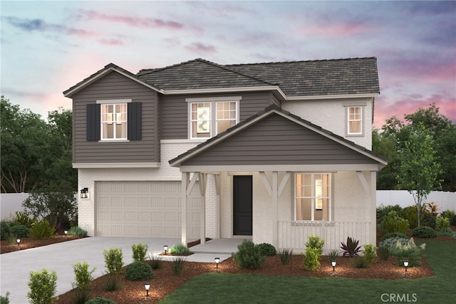 16696 Dara Ave, Chino, CA 91708 - traditional home featuring a porch, an attached garage, driveway, and brick siding