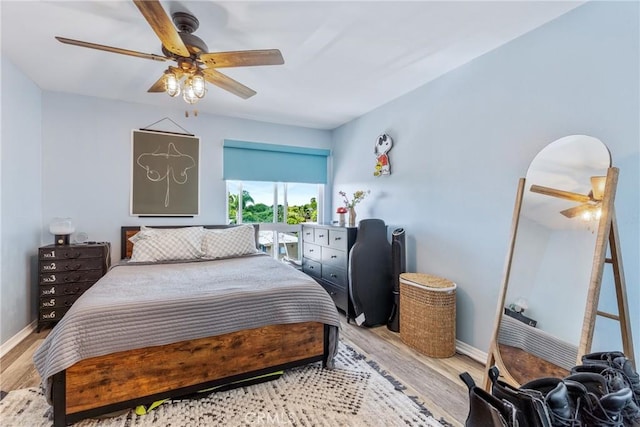 5585 E Pacific Coast Unit 361, Long Beach, CA 90804 - bedroom featuring light wood-style flooring and a ceiling fan