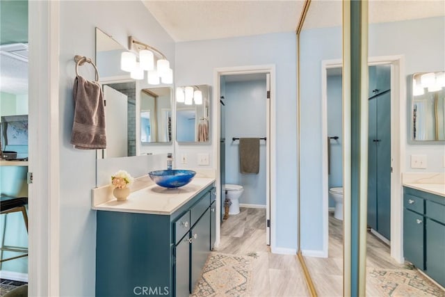 5585 E Pacific Coast Unit 361, Long Beach, CA 90804 - bathroom featuring vanity and wood finished floors