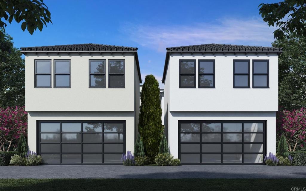 1341 Thomas Ave, Pacific Beach San Diego, CA 92109 - view of front of house with an attached garage and stucco siding