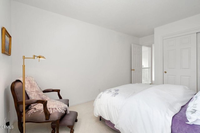 2911 Butter Creek Dr, Pasadena, CA 91107 - bedroom with light carpet, a closet, and baseboards