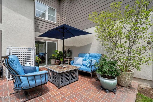 2911 Butter Creek Dr, Pasadena, CA 91107 - view of patio featuring an outdoor living space with a fire pit