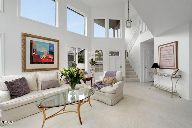 2911 Butter Creek Dr, Pasadena, CA 91107 - living area featuring a high ceiling, stairway, and carpet flooring