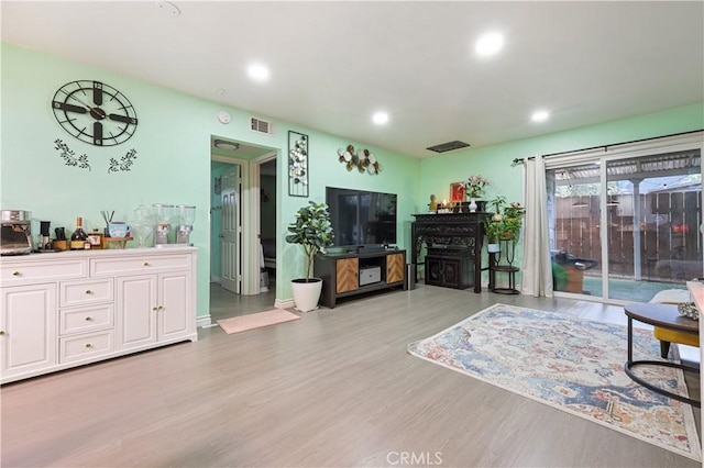 1257 E Grand Ave Unit A, Escondido, CA 92027 - living area featuring wood finished floors and recessed lighting