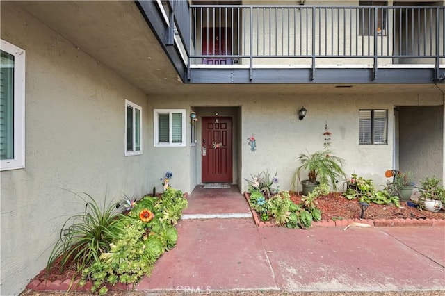 1257 E Grand Ave Unit A, Escondido, CA 92027 - property entrance with stucco siding and a balcony
