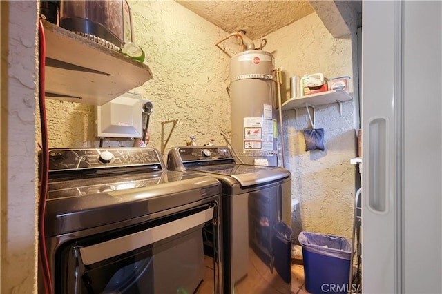 1257 E Grand Ave Unit A, Escondido, CA 92027 - washroom with secured water heater, separate washer and dryer, and a textured wall