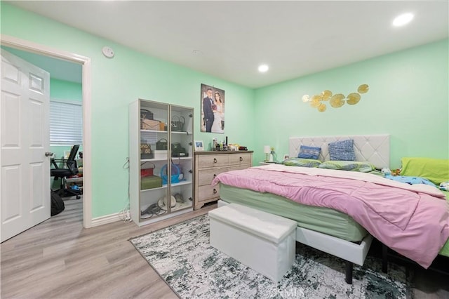 1257 E Grand Ave Unit A, Escondido, CA 92027 - bedroom featuring light wood-style flooring, recessed lighting, an office area, and baseboards