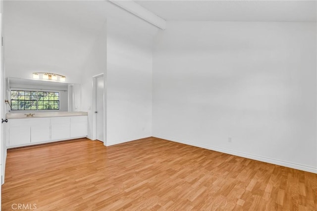 26701 Quail Unit 61, Laguna Hills, CA 92656 - unfurnished room with light wood-style flooring and baseboards