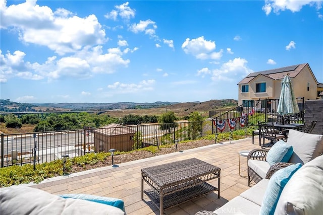 843 Longhorn Way, Rancho Mission Viejo, CA 92694 - view of patio / terrace featuring an outdoor living space, outdoor dining space, and a mountain view