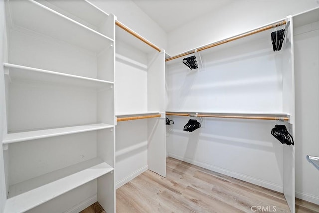 843 Longhorn Way, Rancho Mission Viejo, CA 92694 - walk in closet featuring wood finished floors