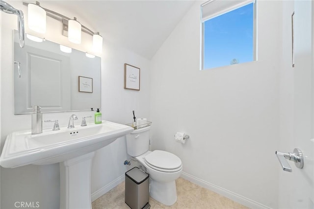 843 Longhorn Way, Rancho Mission Viejo, CA 92694 - bathroom featuring toilet, baseboards, and vaulted ceiling