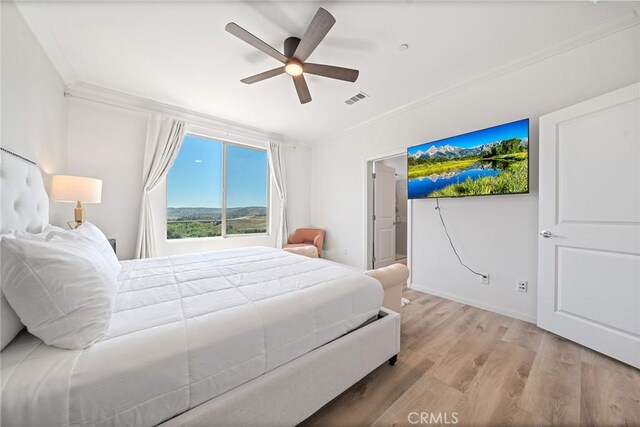 843 Longhorn Way, Rancho Mission Viejo, CA 92694 - bedroom with crown molding, wood finished floors, and ceiling fan