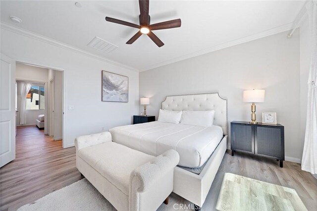 843 Longhorn Way, Rancho Mission Viejo, CA 92694 - bedroom with wood finished floors, ornamental molding, baseboards, and a ceiling fan