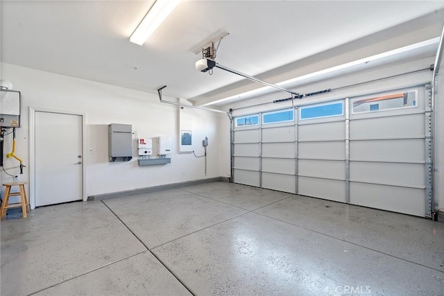 843 Longhorn Way, Rancho Mission Viejo, CA 92694 - garage featuring a garage door opener and baseboards