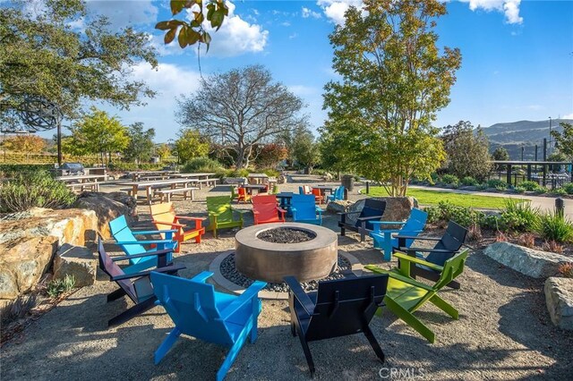 843 Longhorn Way, Rancho Mission Viejo, CA 92694 - view of patio / terrace with a fire pit and a mountain view