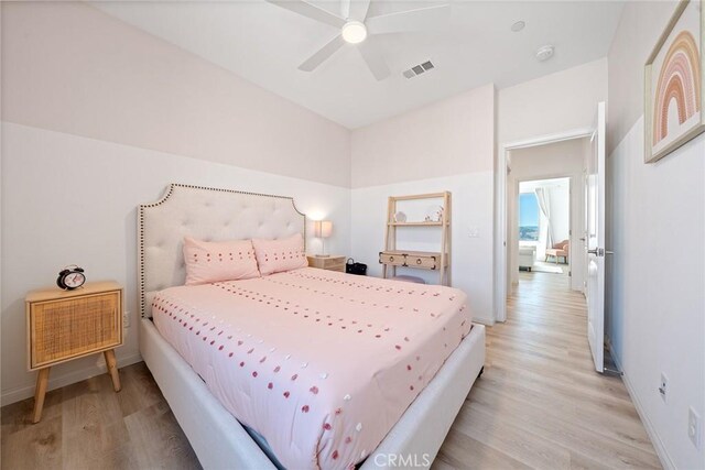 843 Longhorn Way, Rancho Mission Viejo, CA 92694 - bedroom with light wood-style flooring, a ceiling fan, and baseboards
