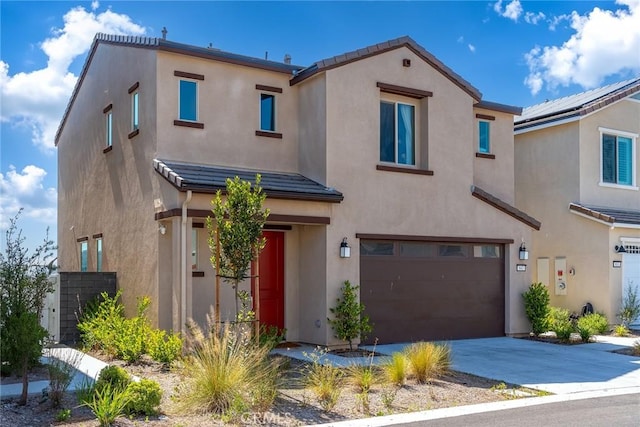 843 Longhorn Way, Rancho Mission Viejo, CA 92694 - view of front of house with a garage, stucco siding, driveway, and a tiled roof