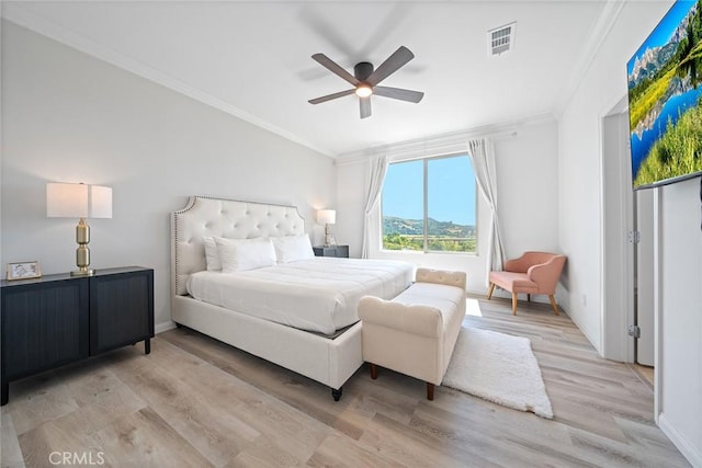 843 Longhorn Way, Rancho Mission Viejo, CA 92694 - bedroom with ornamental molding, light wood-style flooring, baseboards, and ceiling fan