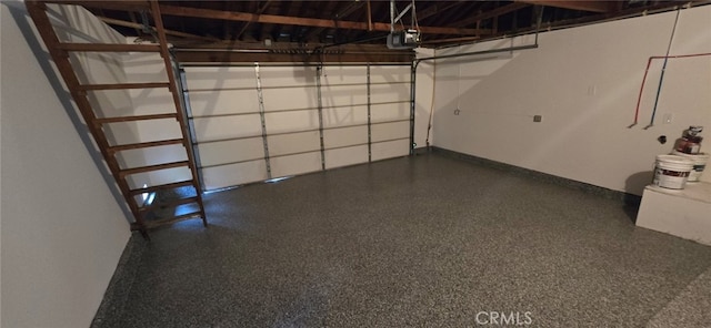 1364 Park Plaza Dr, Long Beach, CA 90804 - garage featuring a garage door opener and baseboards