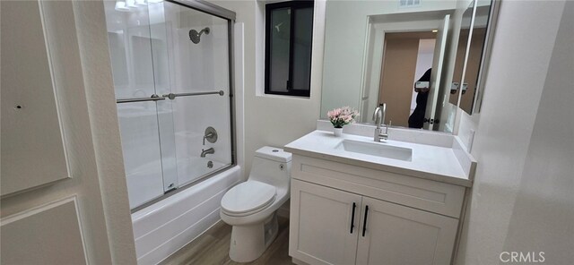 1364 Park Plaza Dr, Long Beach, CA 90804 - full bath with vanity, toilet, and bath / shower combo with glass door