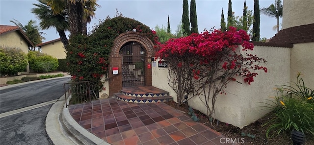 1364 Park Plaza Dr, Long Beach, CA 90804 - property entrance with a gate and stucco siding