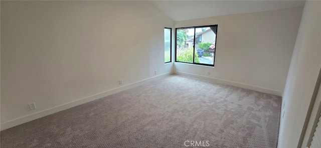 1364 Park Plaza Dr, Long Beach, CA 90804 - carpeted empty room featuring lofted ceiling and baseboards