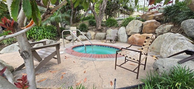 1364 Park Plaza Dr, Long Beach, CA 90804 - view of swimming pool with an in-ground hot tub and a patio