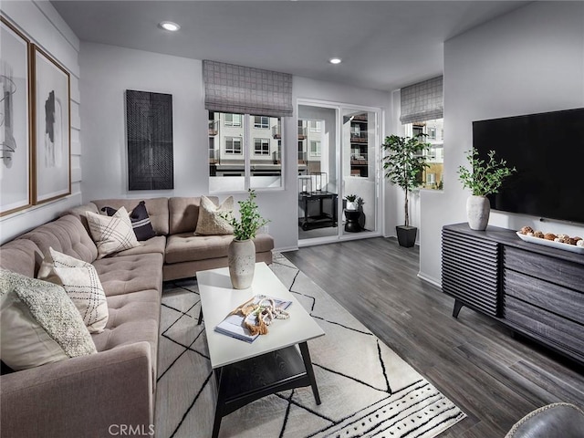209 Aurora Ln, Pomona, CA 91767 - living room with recessed lighting, wood finished floors, and baseboards