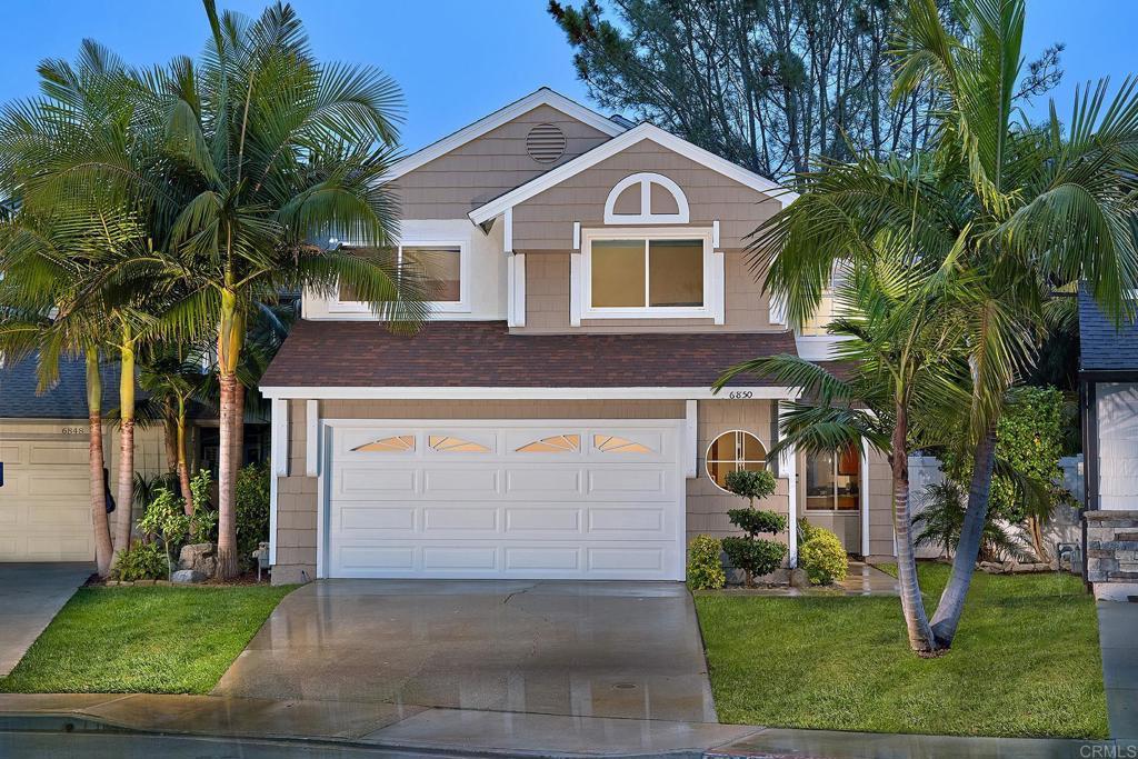6850 Via Verano, Carlsbad, CA 92009 - view of front of property featuring driveway, a front yard, a garage, and a shingled roof