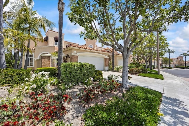 16 Via Barcaza, Coto De Caza, CA 92679 - mediterranean / spanish home featuring stucco siding, concrete driveway, an attached garage, and a tiled roof